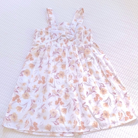 Cupcakes and Cashmere. Girls fall dress. Floral print with bow detail on back. - Picture 4 of 11